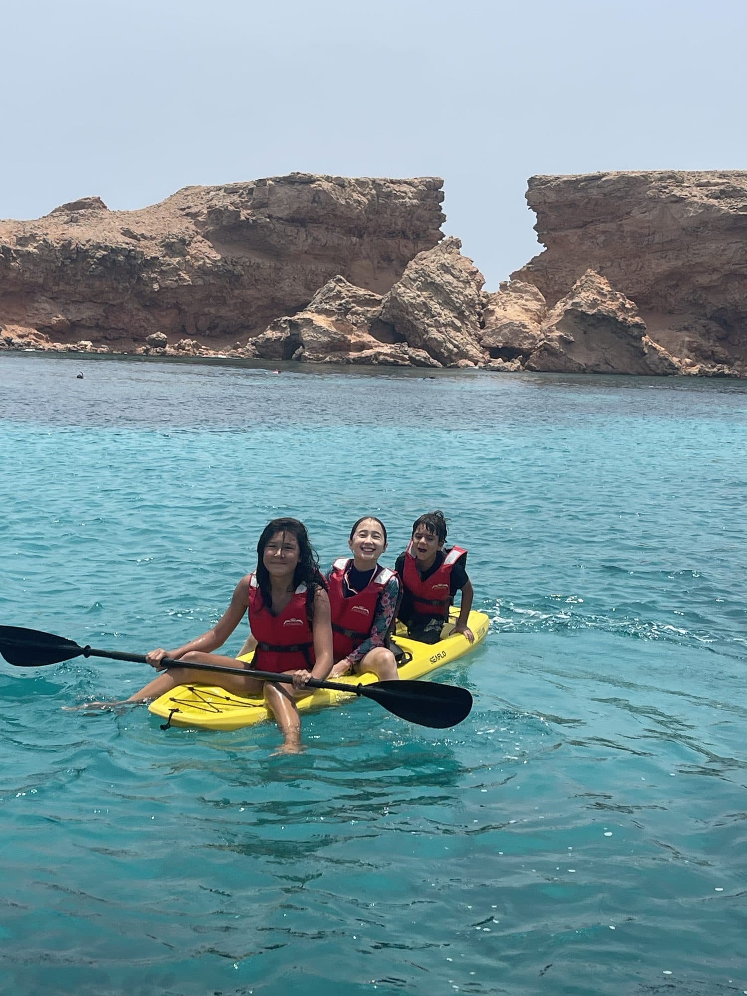A guest with a kayak aboard a Royal Marine Tours boat at the Daymaniyat Islands