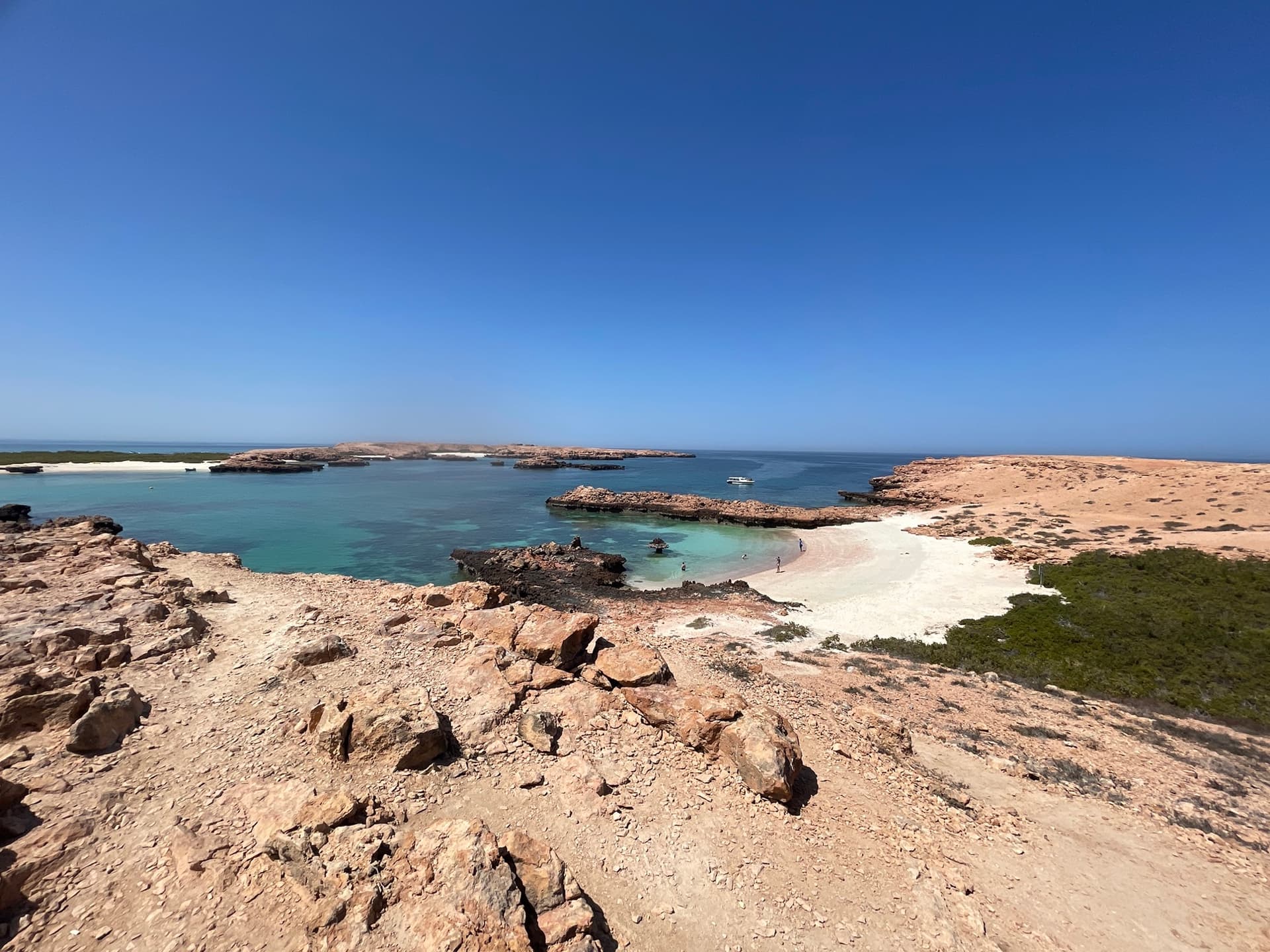 A turquoise cove and white-sand beach in the Daymaniyat Islands near Muscat